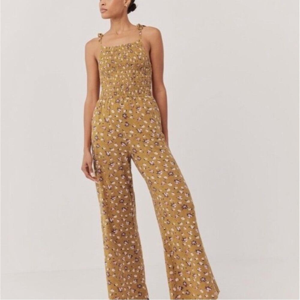 Pact Soirée Jumpsuit One And Done Yellow Floral
Smocked tie strap sz XL
